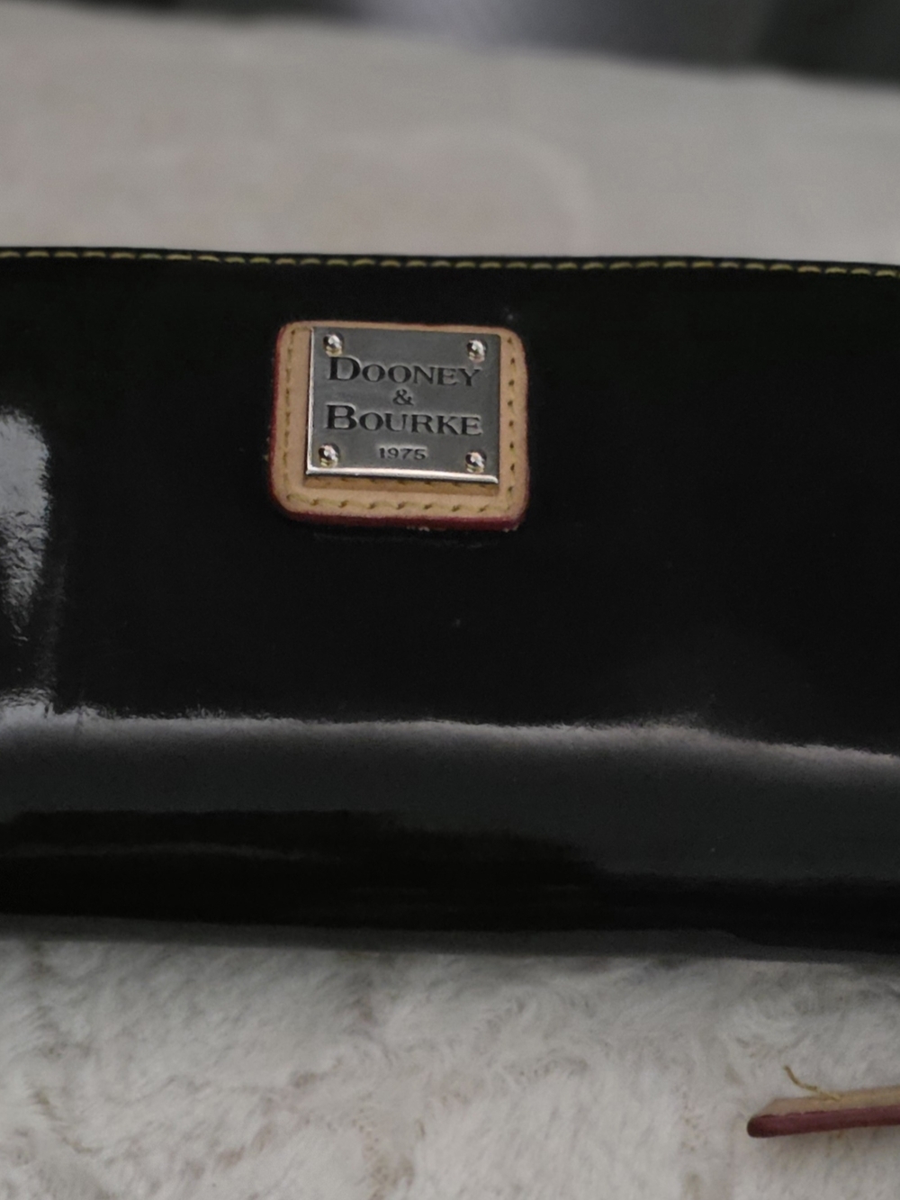Dooney & Bourke Black Patent Leather Wallet with Logo Plaque